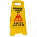 Предупреждающая табличка «Внимание! Мокрый пол»